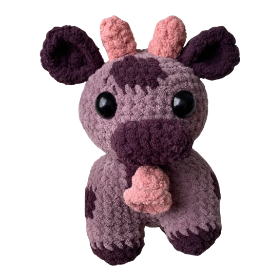 Cute cow with bell plush toy crafted by Monse's Crochet Creations.